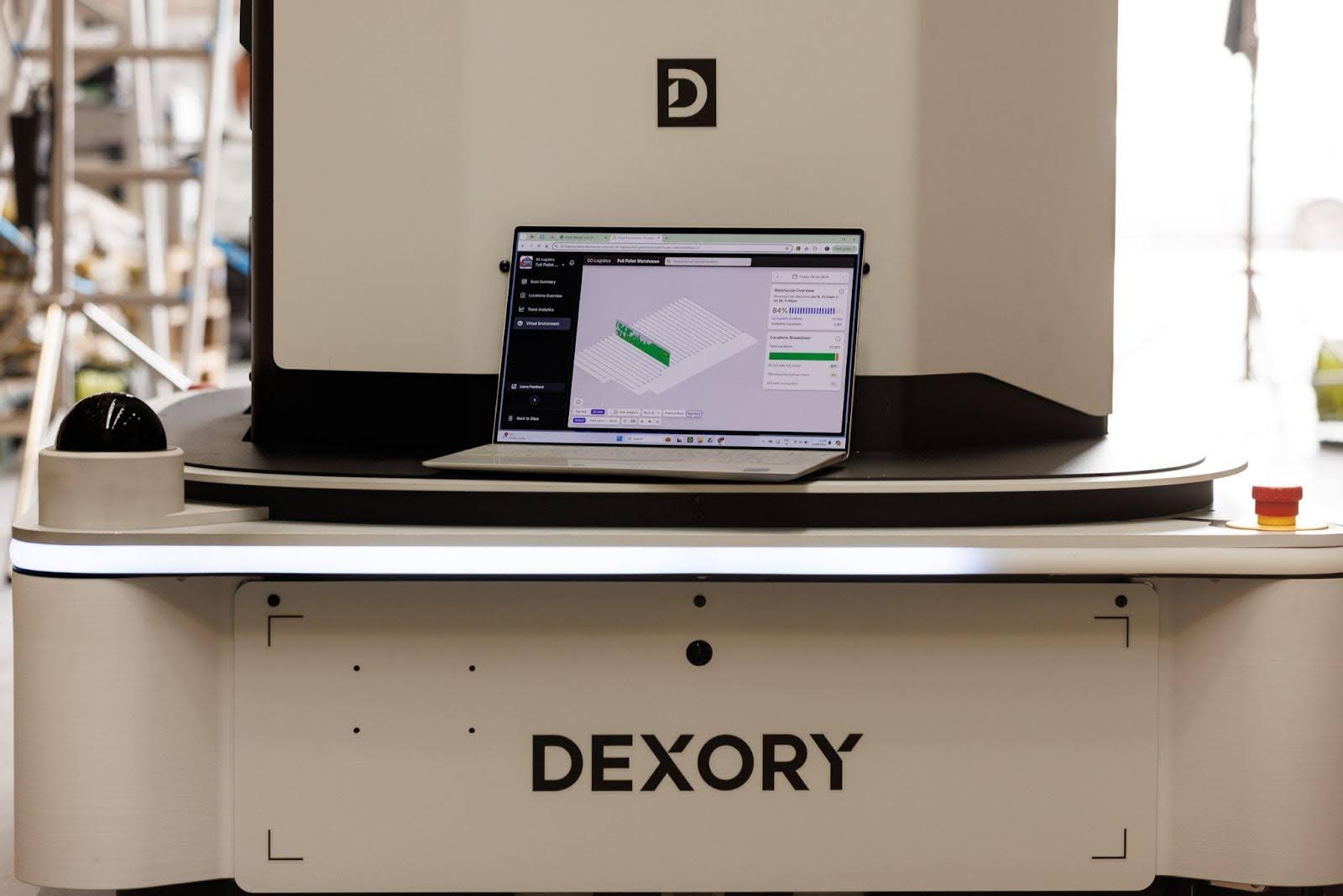 Laptop showing DexoryView software on the base of a Dexory robot