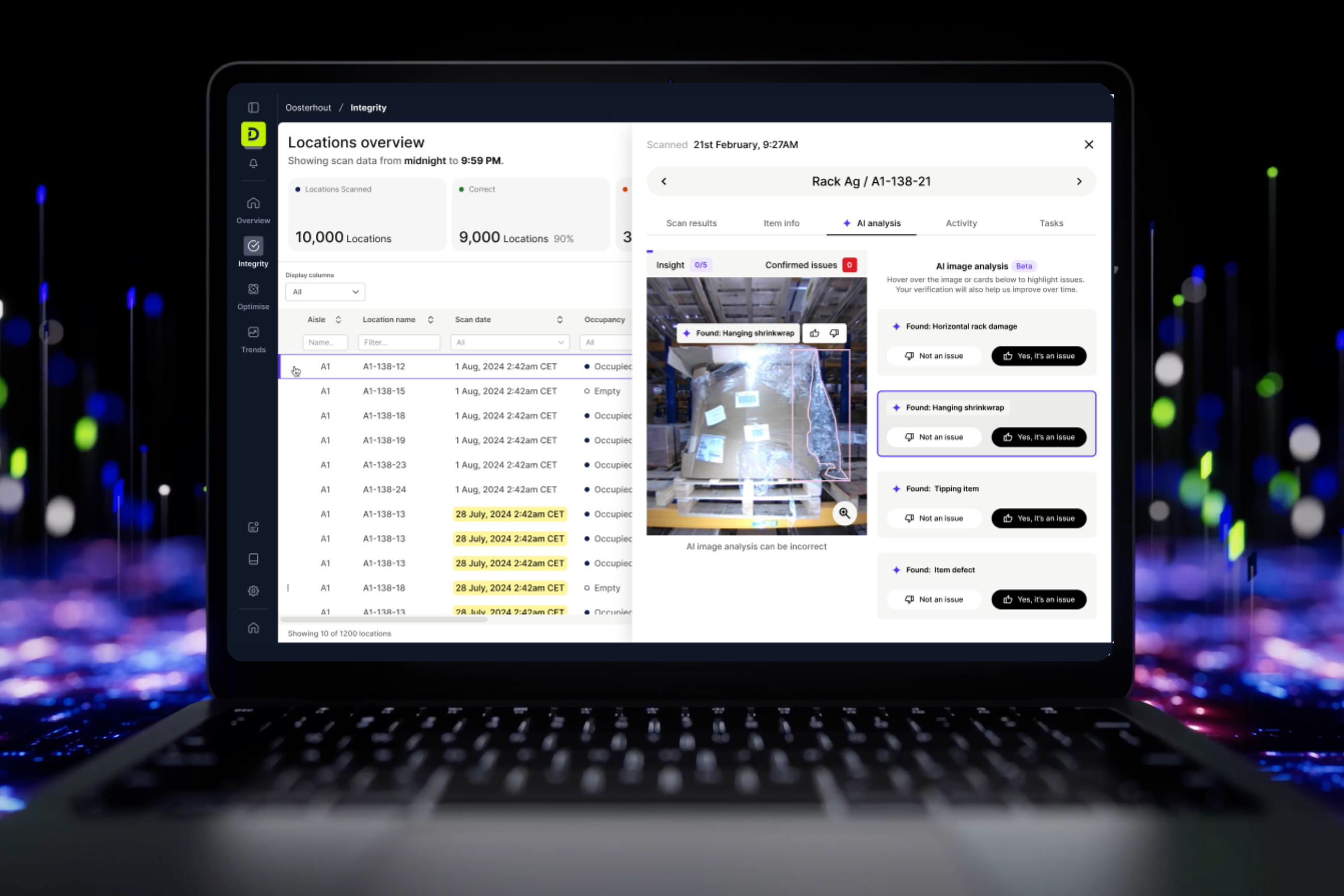 DexoryView Integrity platform displayed on a laptop showing AI-powered locations overview across 10,000 scanned warehouse locations, with real-time issue detection including hanging shrinkwrap, rack damage and tipping items, supporting audit-grade data governance and warehouse investment ROI.