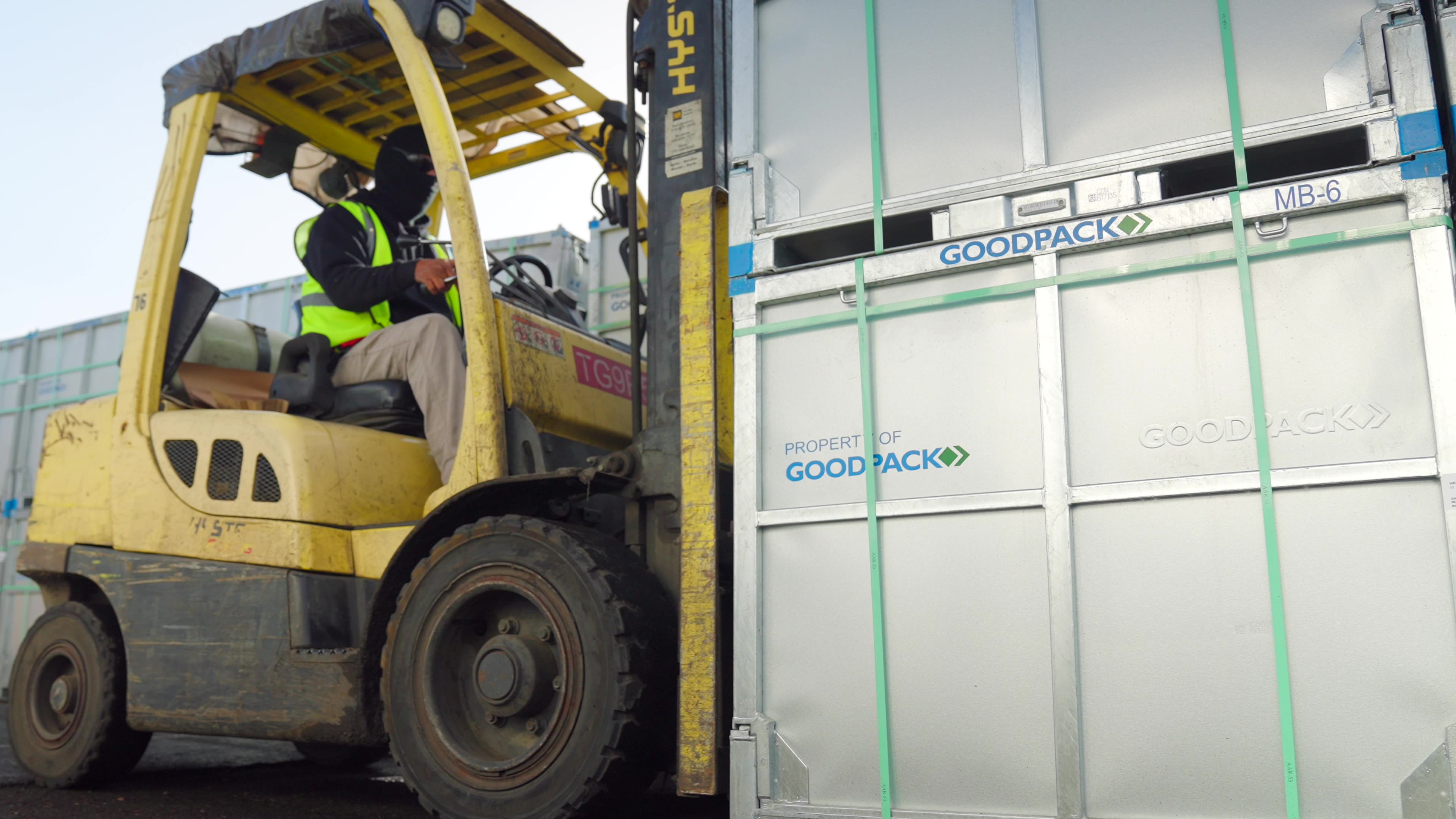 Forklift moving Goodpack Intermediate Bulk Containers