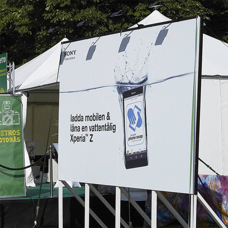 Outdoor billboard showing a Sony Xperia Z smartphone partially submerged in water with text in Swedish promoting a waterproof Xperia Z phone.