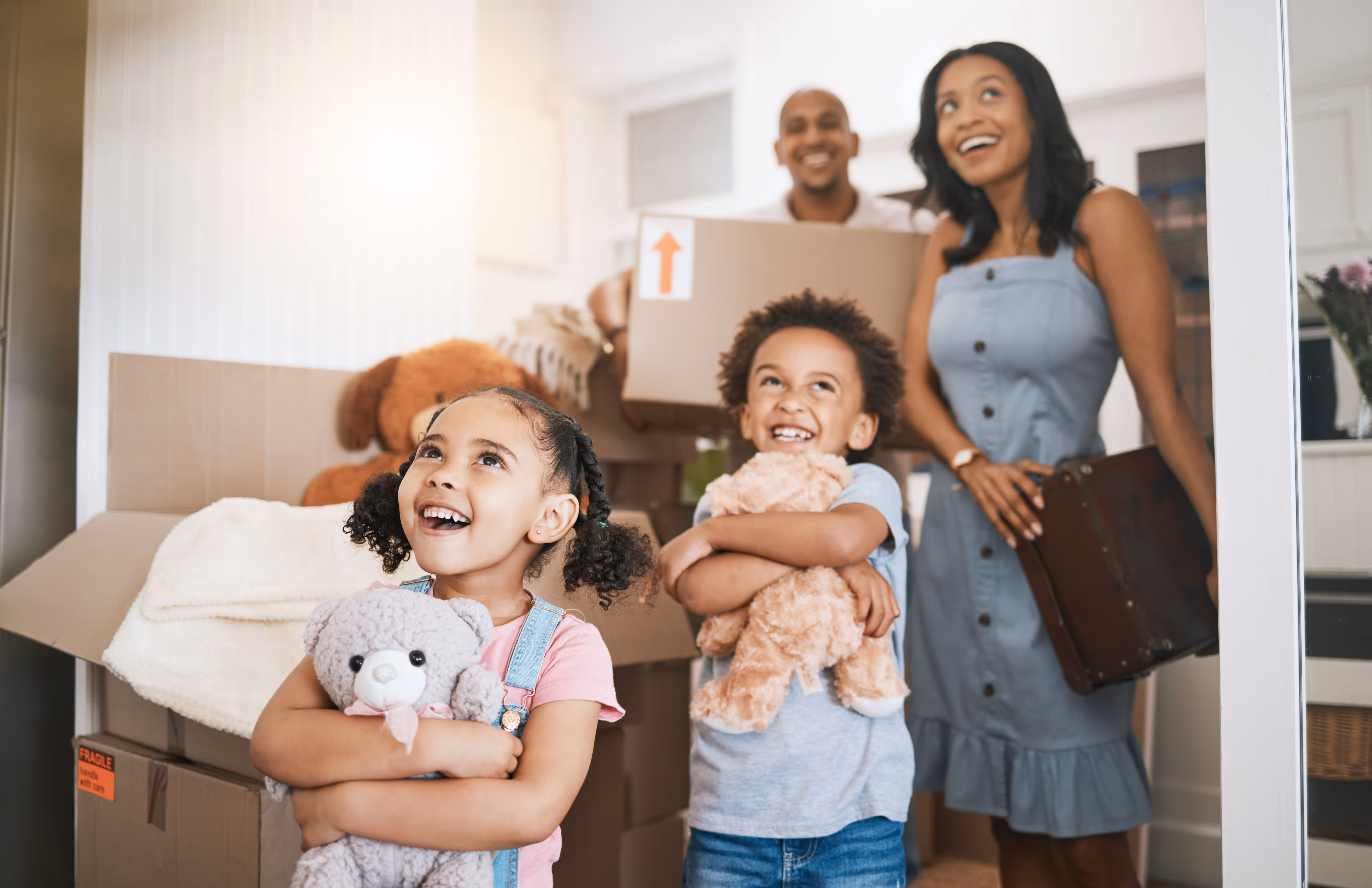 Happy family moving into their rental home in Von Ormy, Texas