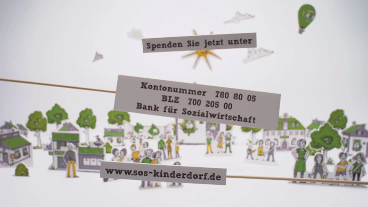 Erklärfilm der Filmproduktion Panda Pictures aus München und Ulm für SOS Kinderdorf. Ein animiertes Spendenkonto und eine Webseite sind über einer Kulisse aus Pappfiguren platziert.