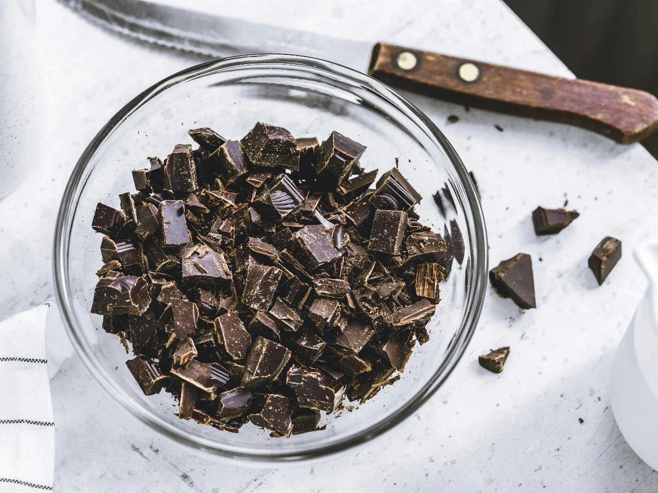 Chocolate bars cut into pieces, showing different types of chocolate