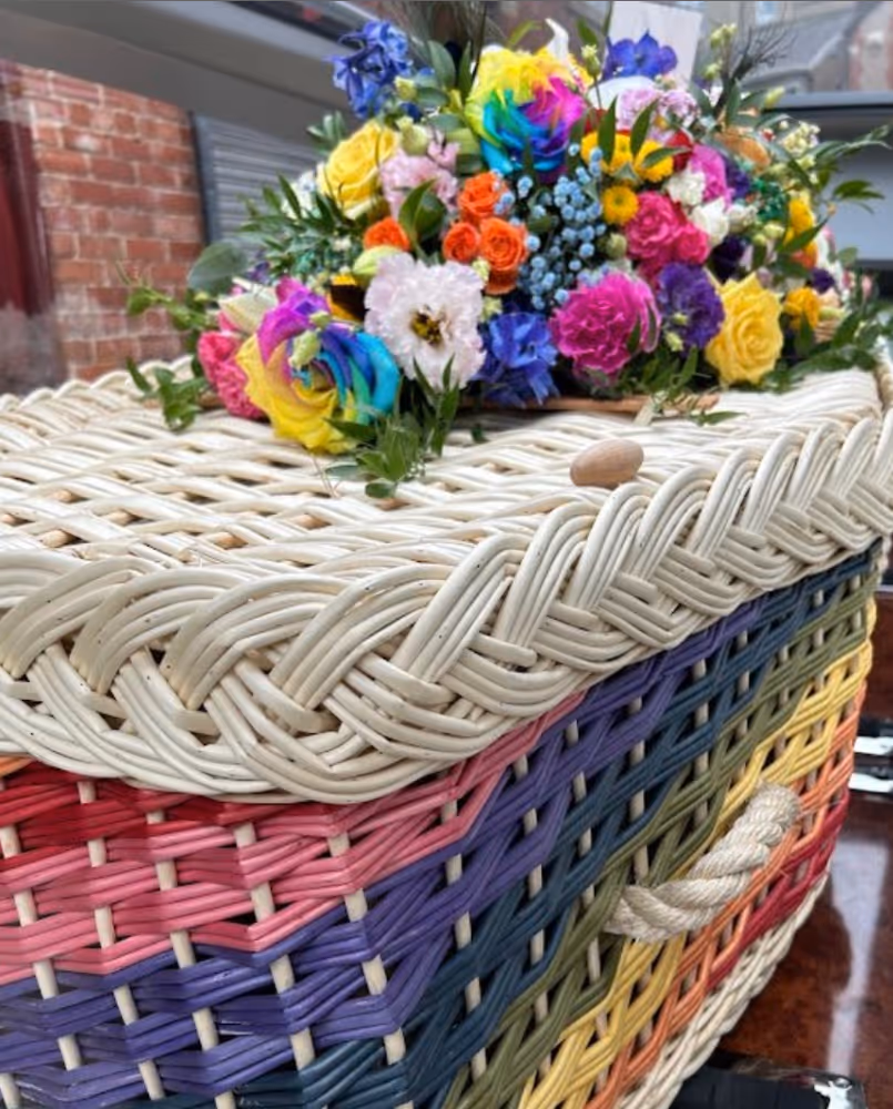 A rainbow wicker coffin from a funeral by Tom Owen & Sons and Kate Rostance funeral celebrant 