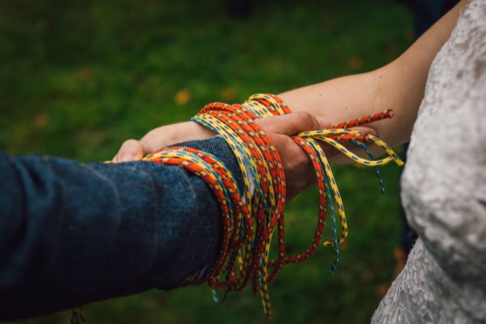 Handfasting symbolic act for a couple who love climbing 