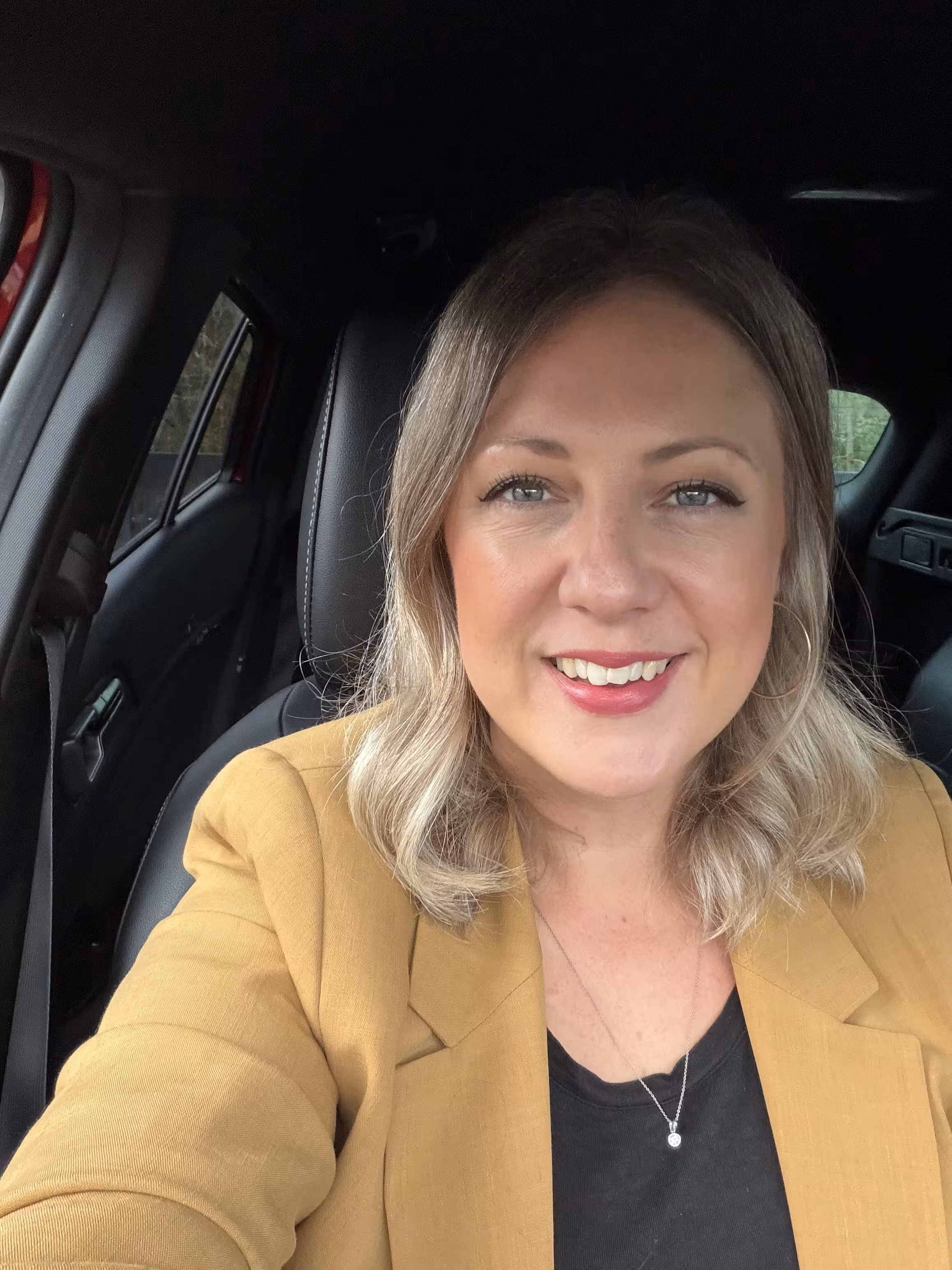 Female funeral celebrant in Bangor Crematorium, North Wales, professional portrait of a humanist celebrant before a non-religious funeral service