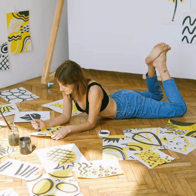 Artist working on the floor