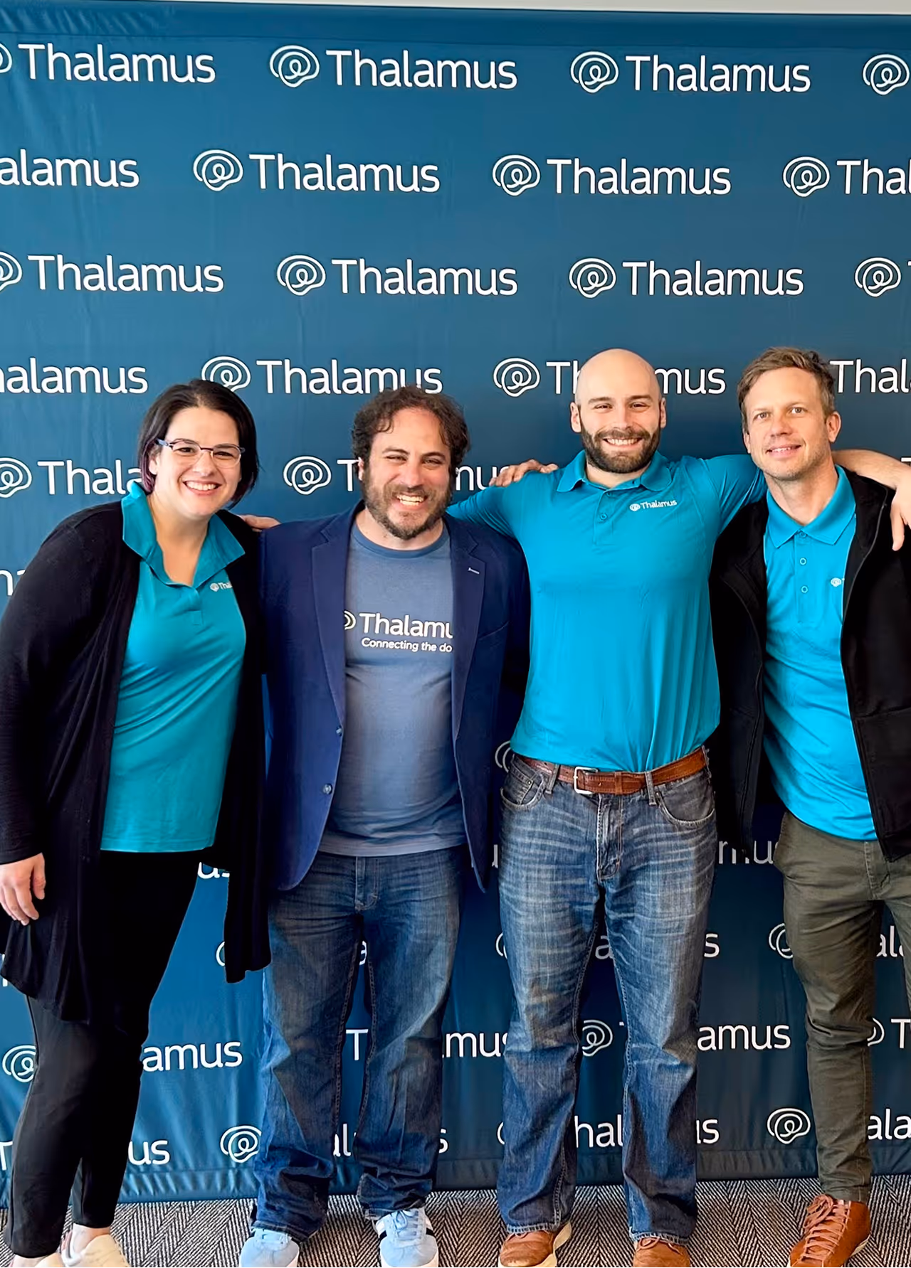 A group of people standing next to each other.