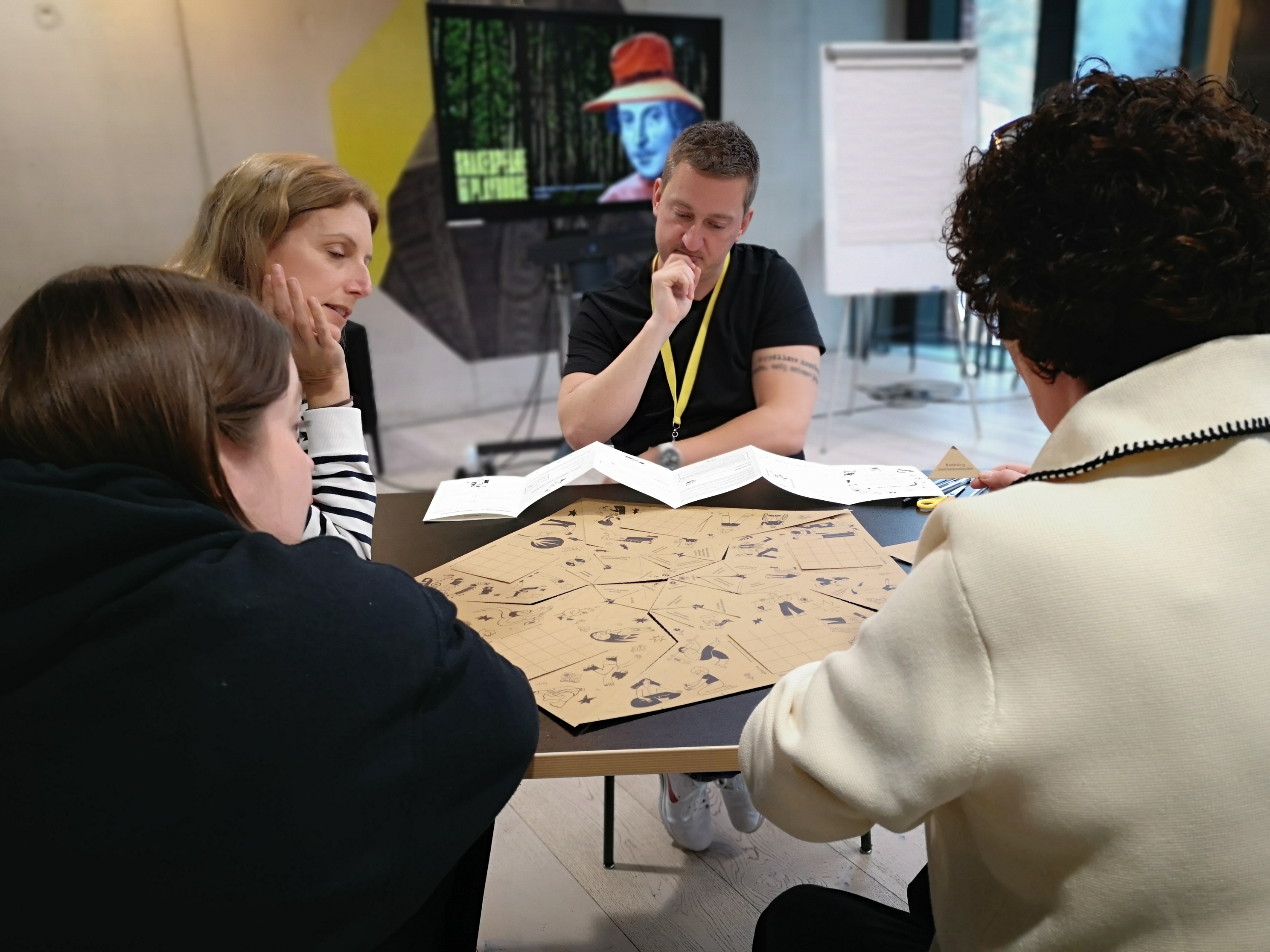 a team playing a board game