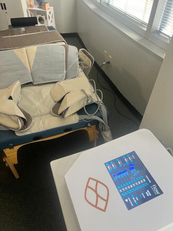 Physical therapist assisting patient with rehabilitation exercises at Complete Care Clinic