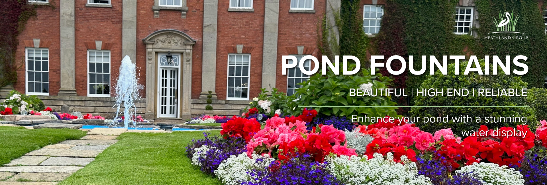 Pond fountain running in a garden oxygenating the water with a beautiful display