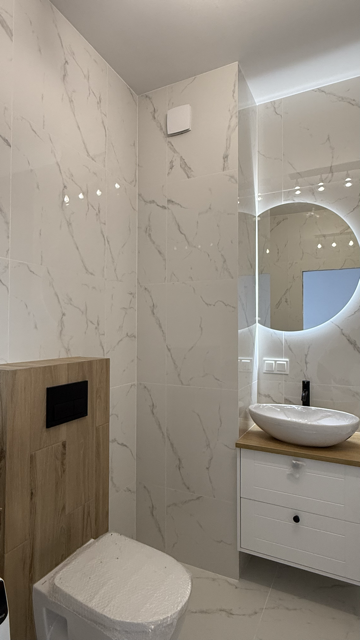 Zdjęcia realizowanego wykończenia białej kuchni w stylu modern