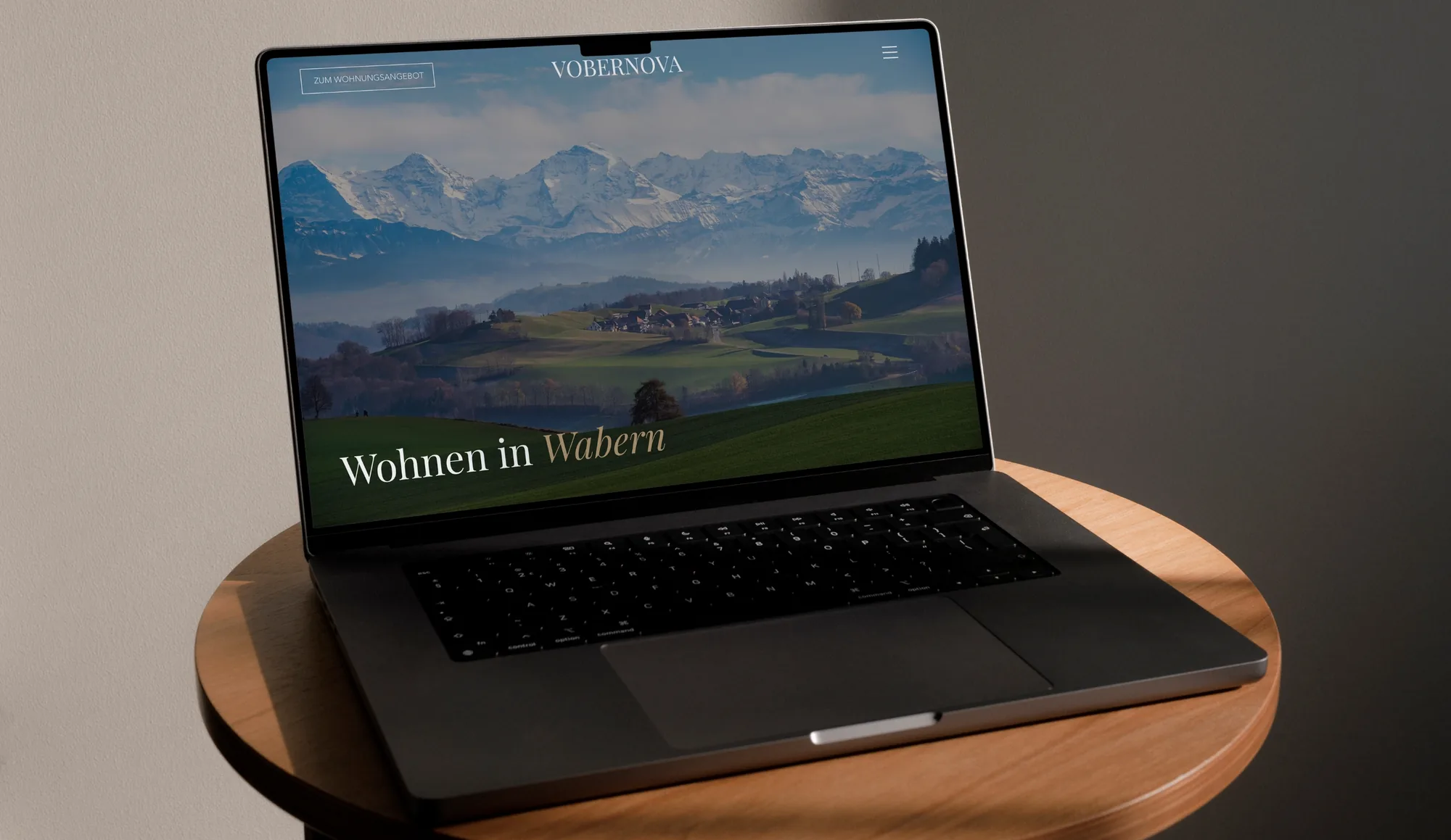 Websites – a property website on a laptop reading “Wohnen in Wabern”
