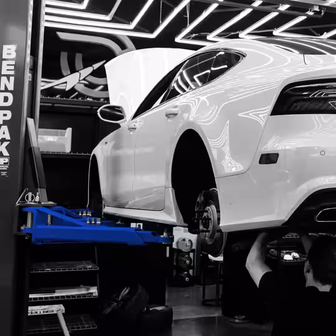 Motor City Auto Detailing expert performing paint correction - ceramic coating application