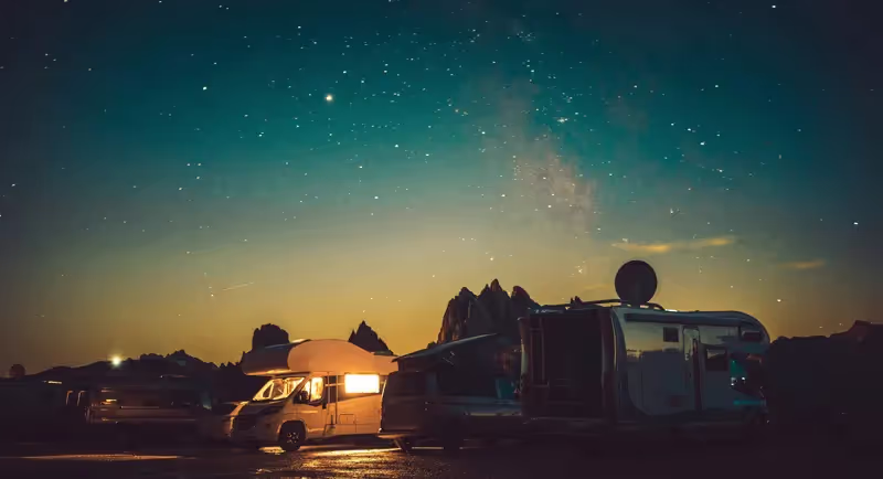 RVs camped out underneath the stars