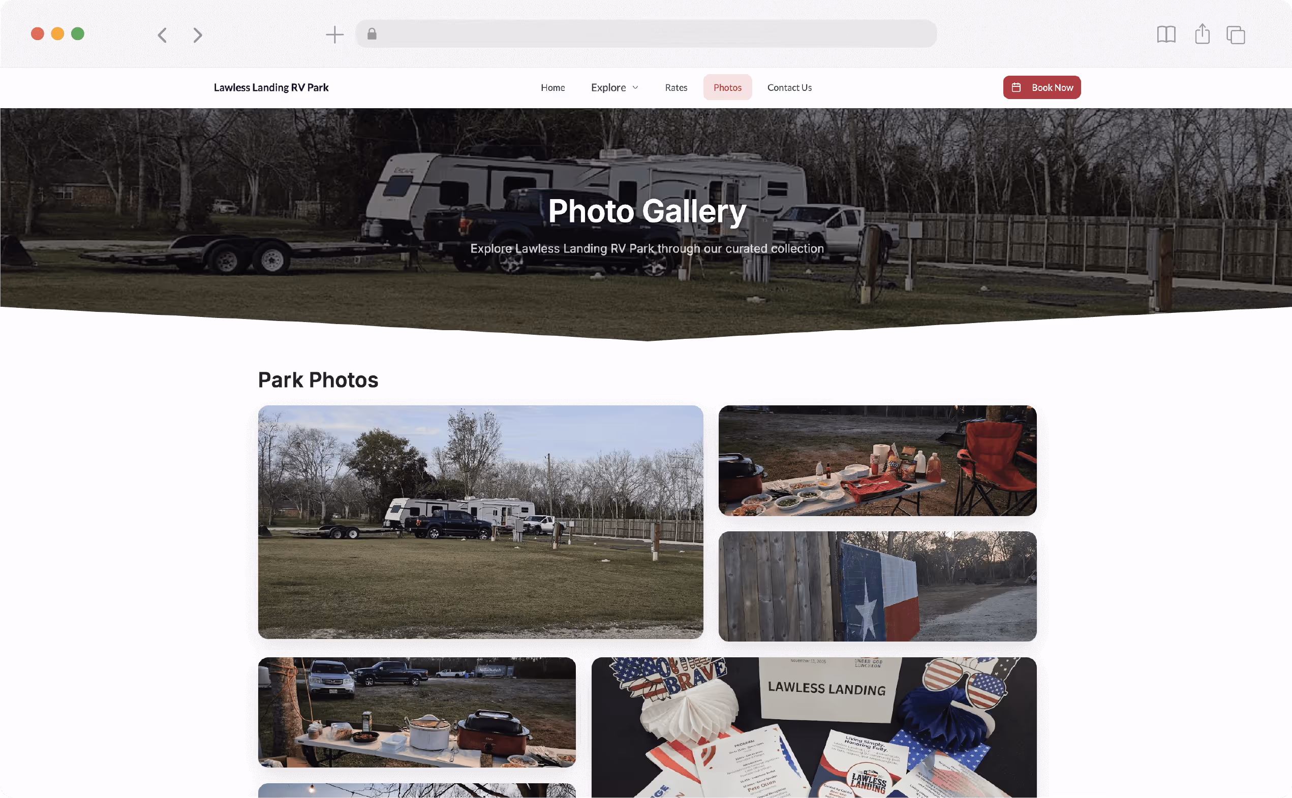 RV and pickup truck parked at a grassy campsite at Lawless Landing RV Park surrounded by trees and fencing