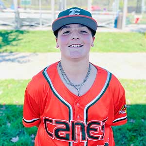 Headshot of Elkridge Hurricanes player Bodi Abel wearing his orange Canes baseball jersey and green Elkridge E logo hat.