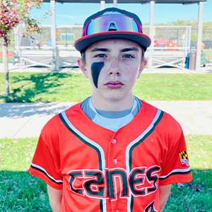 Headshot of Elkridge Hurricanes player Cole Lawrence wearing his orange Canes baseball jersey and green Elkridge E logo hat.