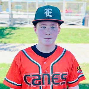 Headshot of Elkridge Hurricanes player Ryan Molino wearing his orange Canes baseball jersey and green Elkridge E logo hat.