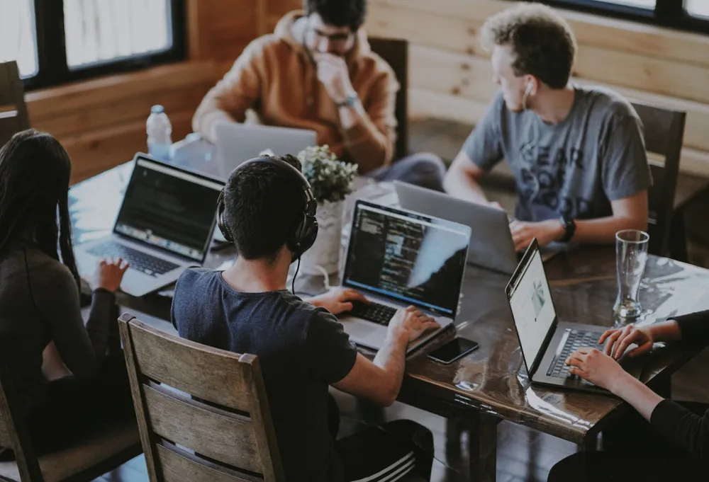 Small group of people at desk