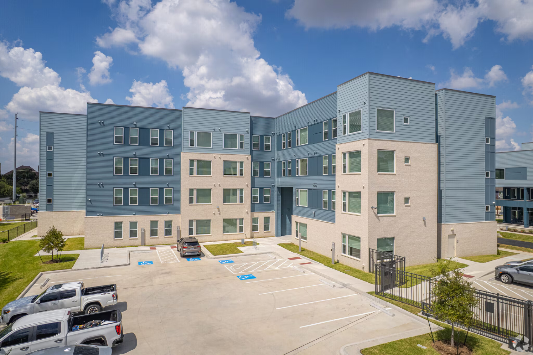 gray exterior with parking lot