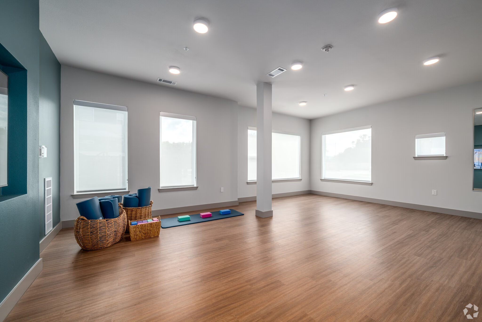fitness room with yoga mats 