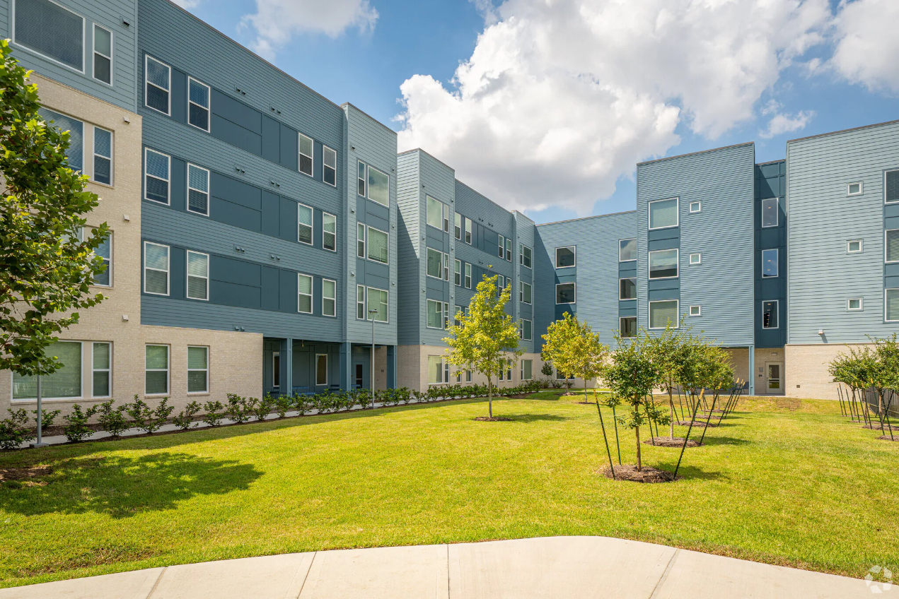 gray exterior with greenery