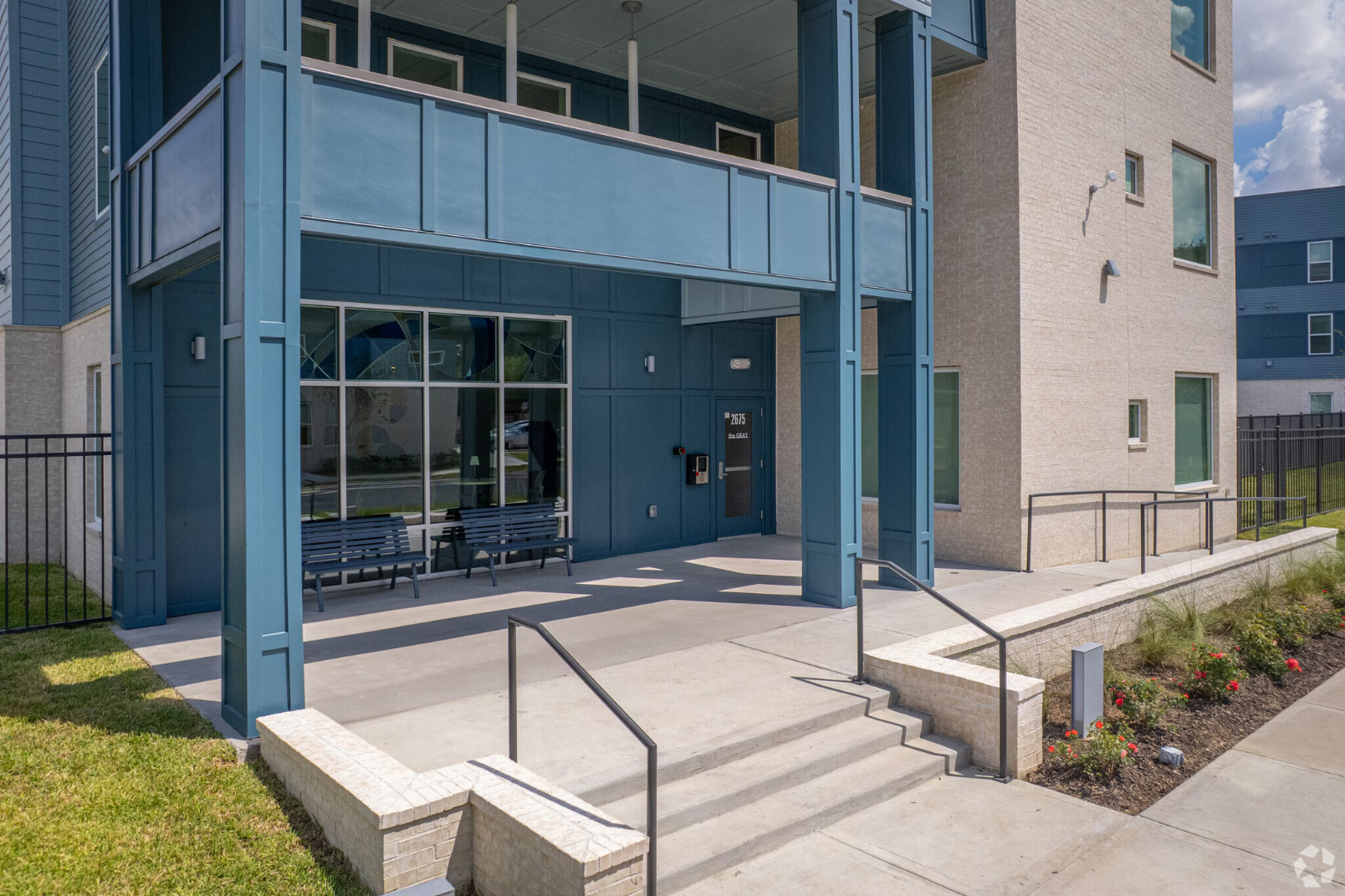 exterior of gray with entry stairs