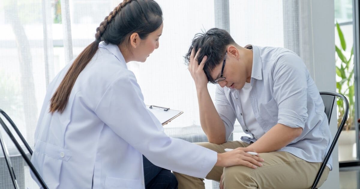 A medical professional discussing treatment options with a patient, emphasizing the appropriateness of Adderall for MAT patients.