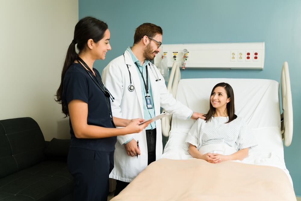 A patient discussing buprenorphine management after surgery with a healthcare professional.