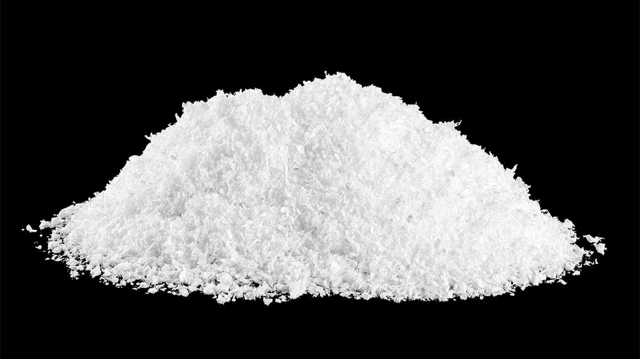 Various forms of heroin including white powder and black tar heroin.