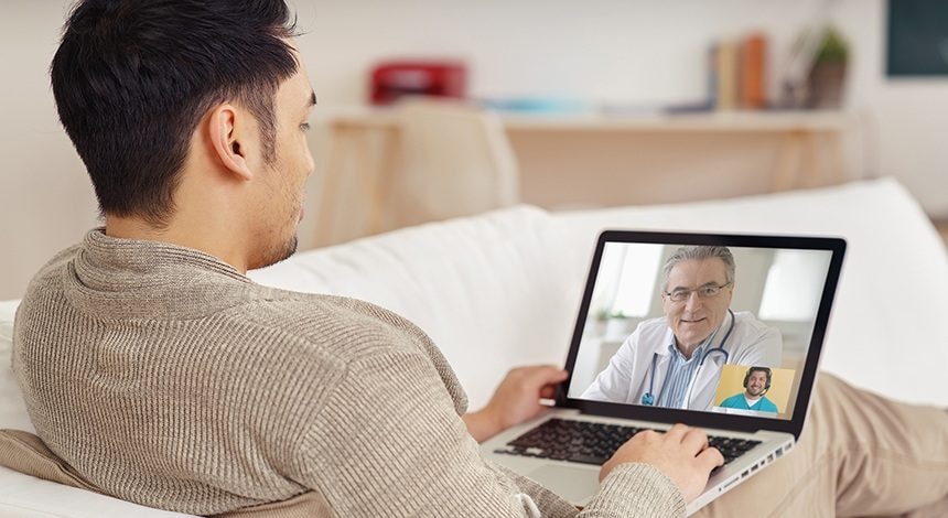 A person consulting with a healthcare provider through a telehealth platform for opioid addiction treatment.