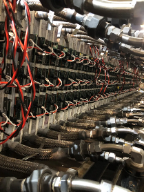 A group of wires connected to a wallAI-generated content may be incorrect.