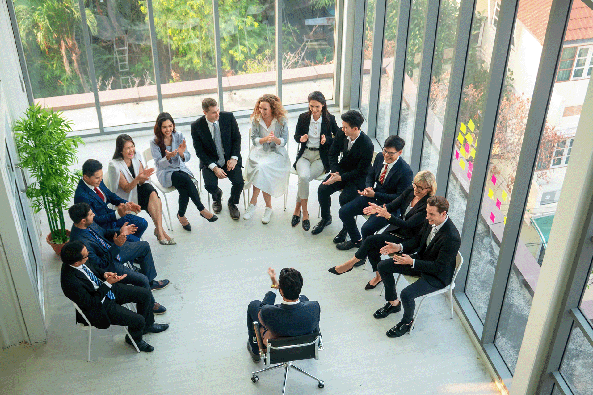 Facilitator guiding a diverse leadership group in a circle-based workshop focused on inclusion, psychological safety, and brave conversations – embodying Habitus’s human-centred approach to culture change