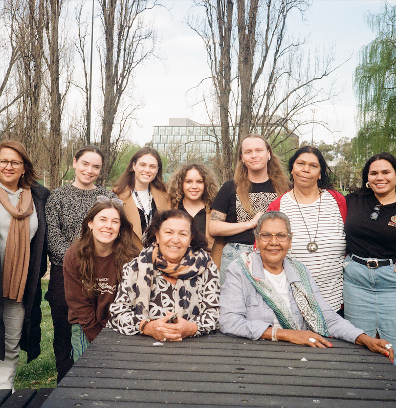 Photo of the Institute team and advisory council outside smiling at the camera