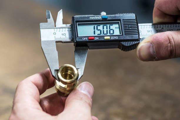 Quality inspection of CNC machined brass nuts 