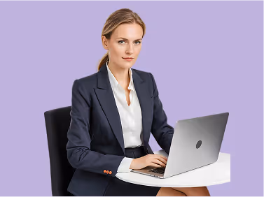 Woman in a business suit with laptop against a light purple background