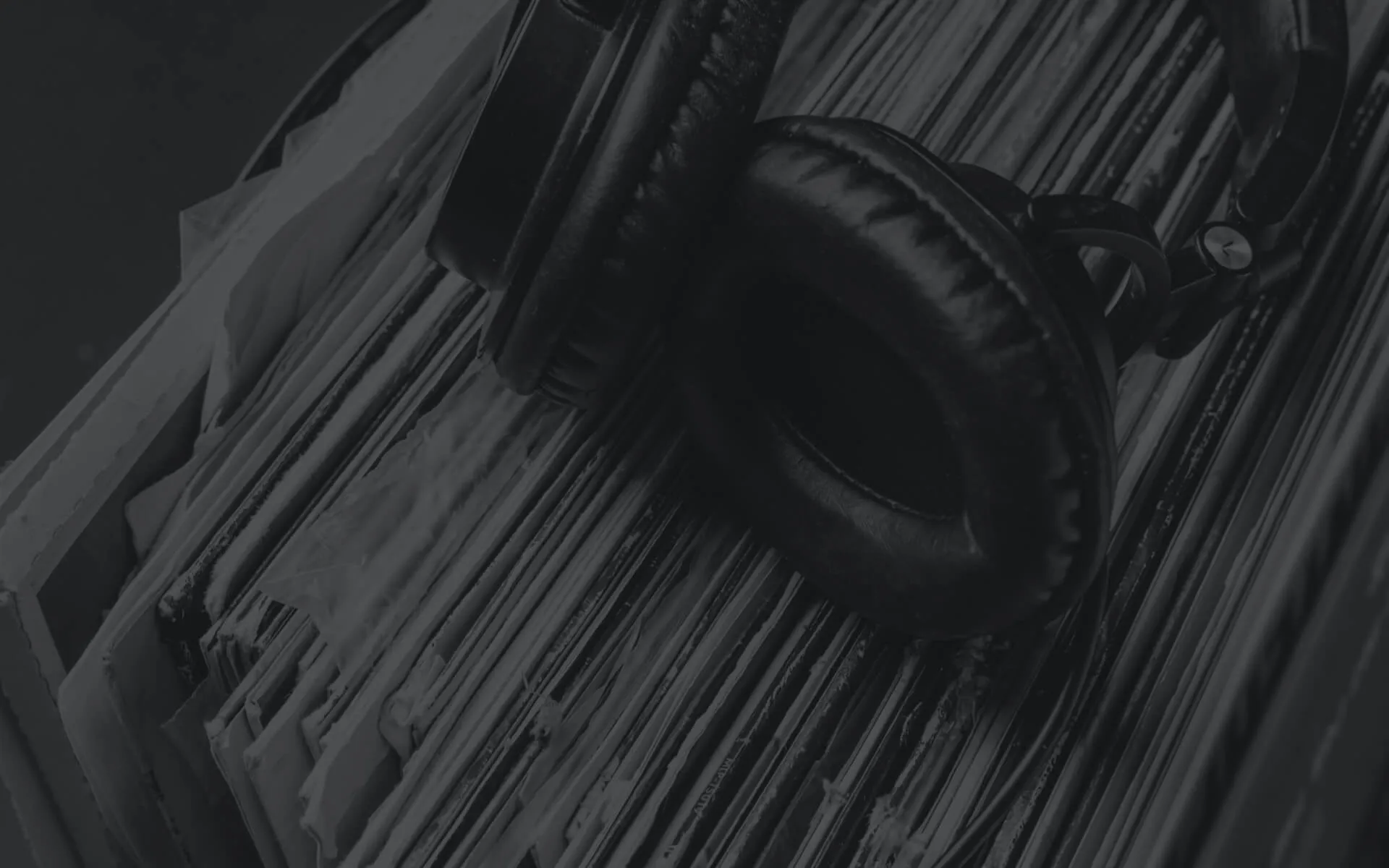 Headphones on top of records