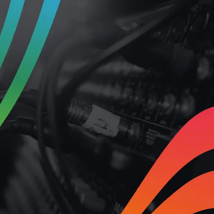 Cables plugged into a soundboard