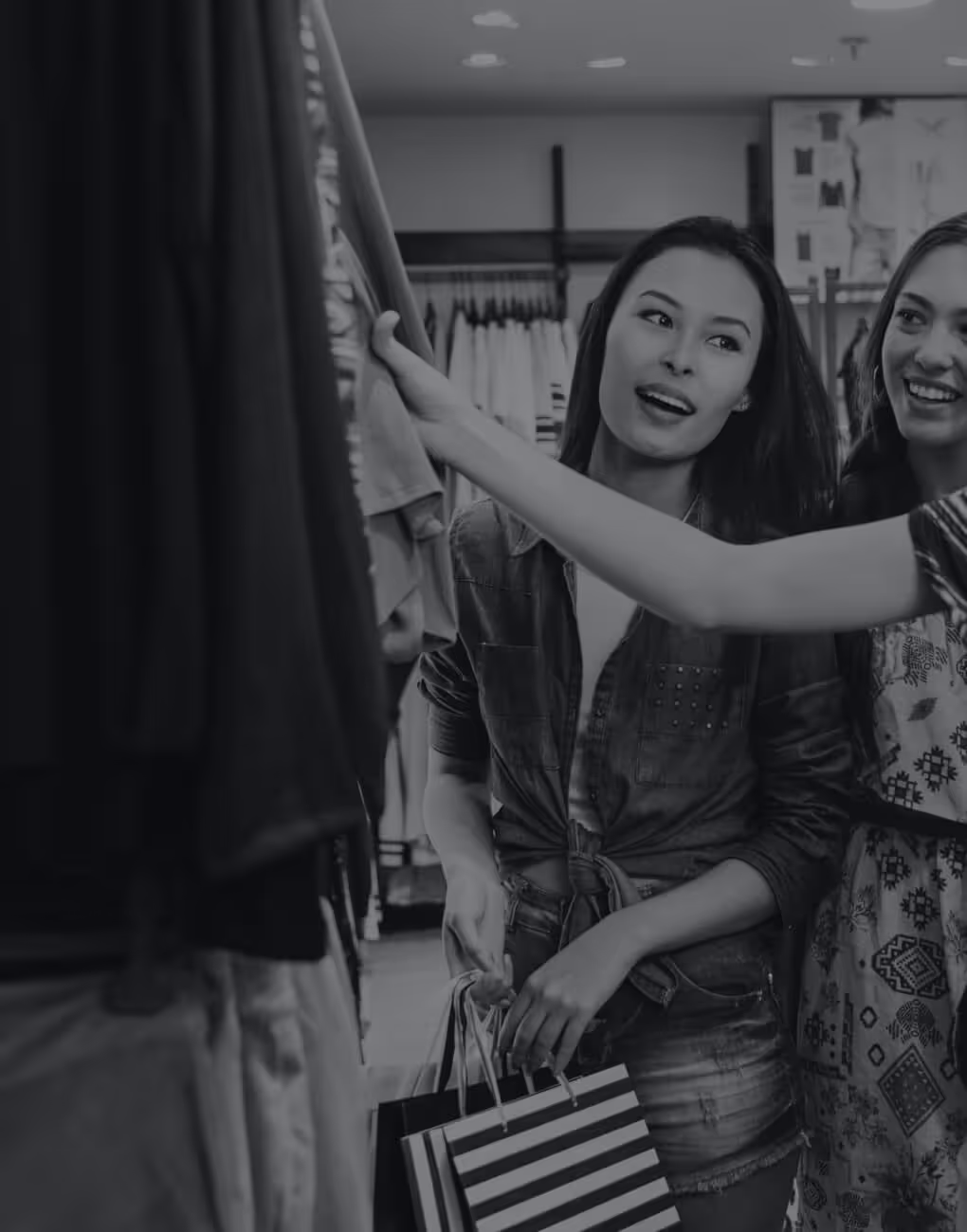 Group of young woman shopping in a clothes store