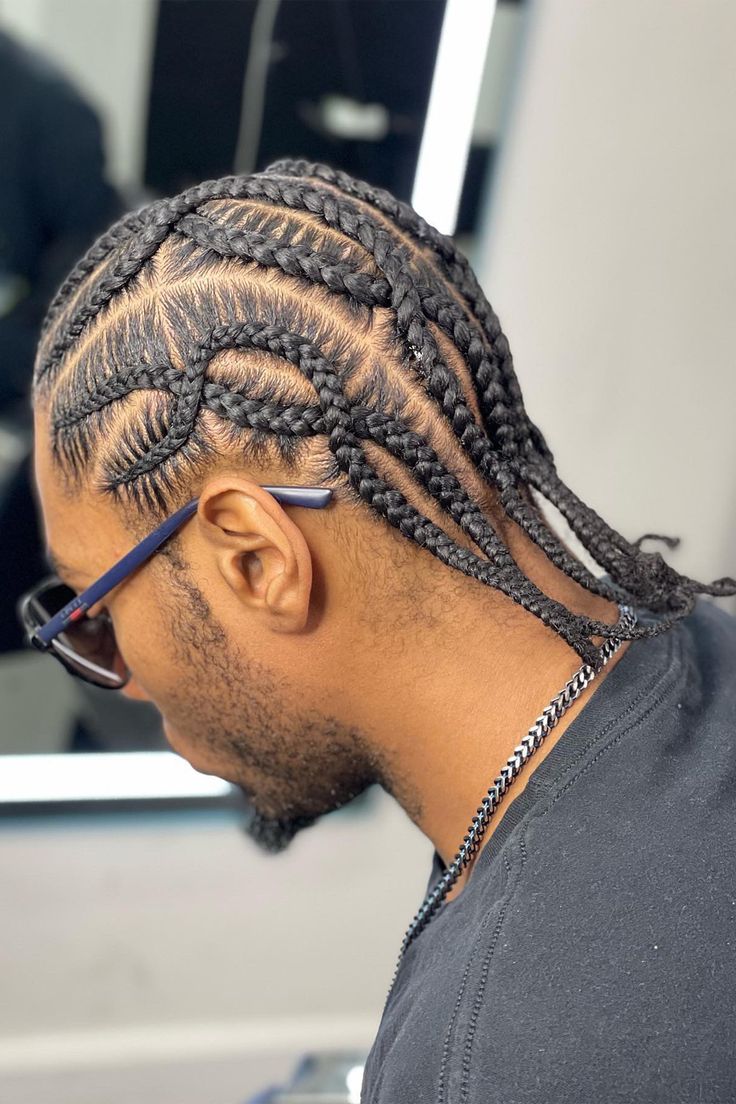 Man with stitch braids for men showing geometric curved pattern and horizontal stitch detail