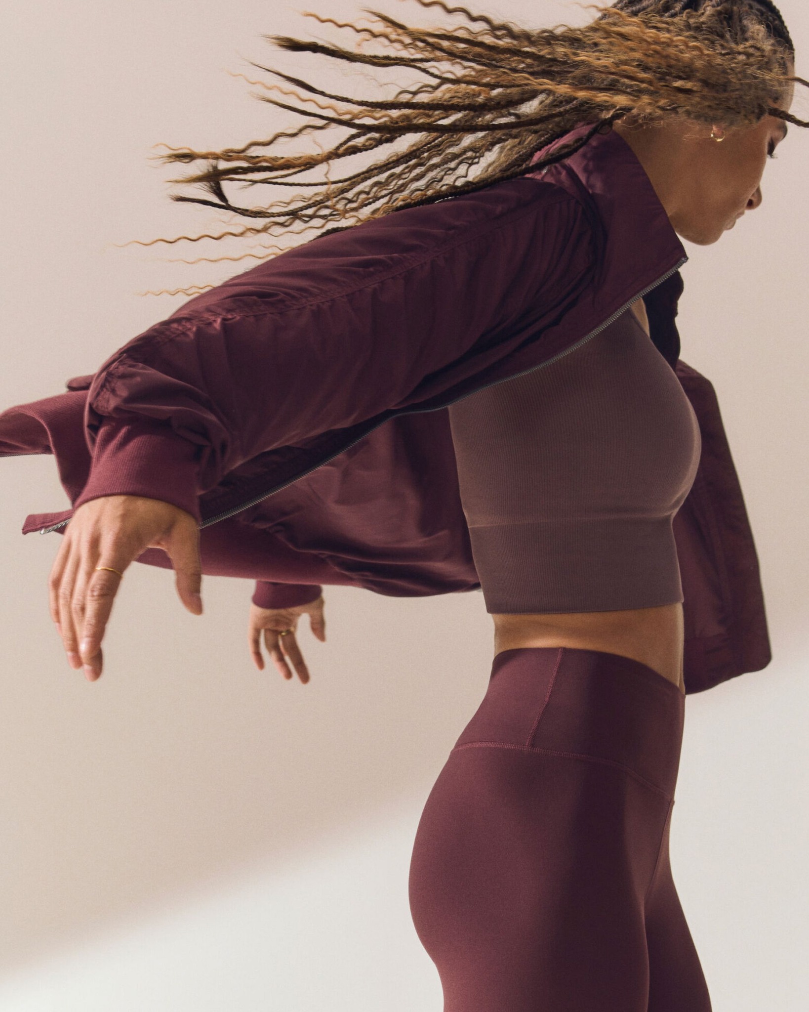 Athleta model wearing the Garnett color