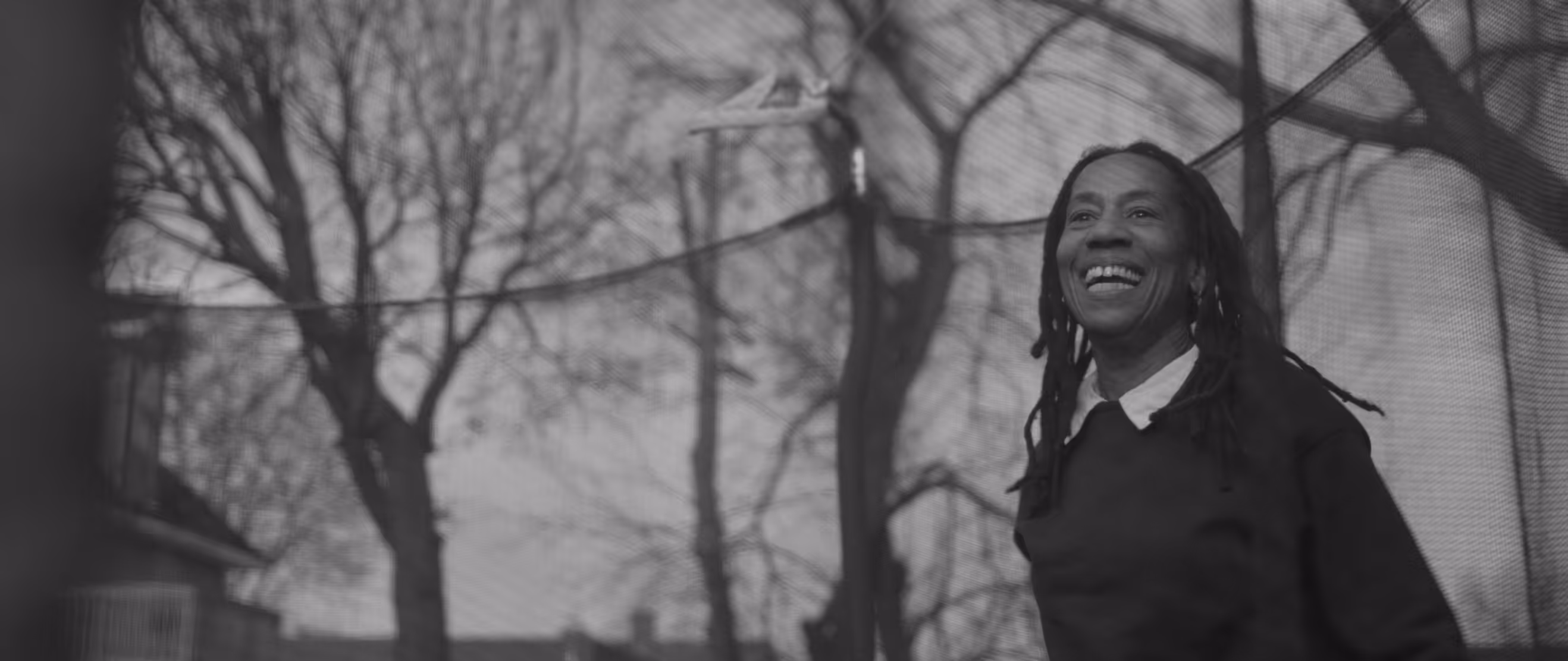 Black and white photo of a smiling african american woman
