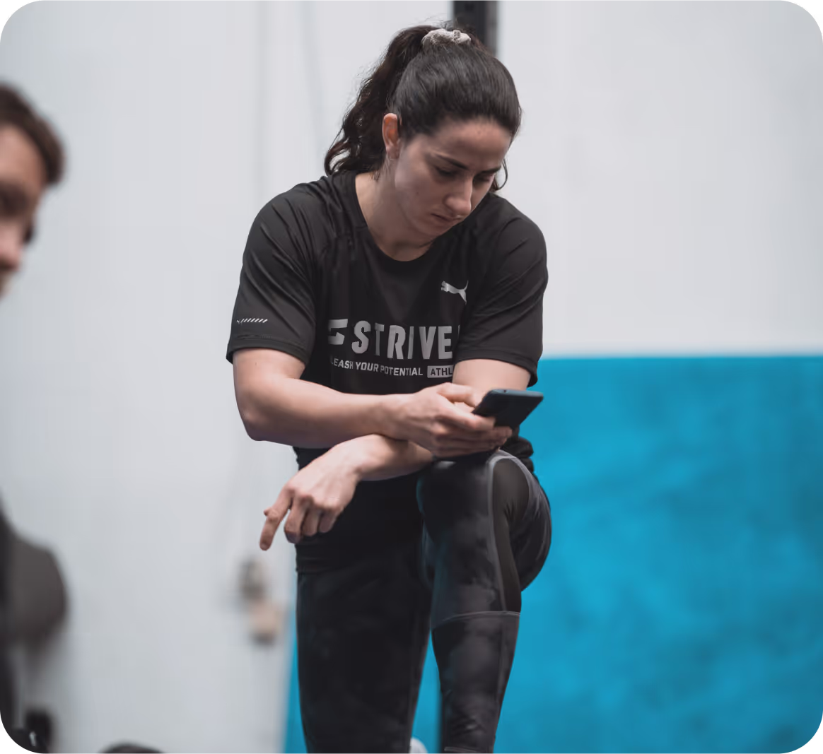 Girl working out with heavy weights