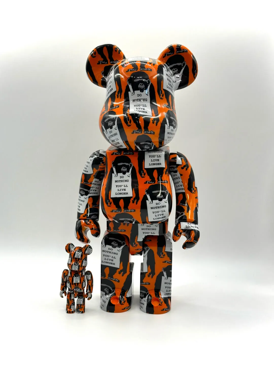 bearbrick banksy monkey sign 100% and 400% set for sale at the wiseguys barbershop in glenhaven