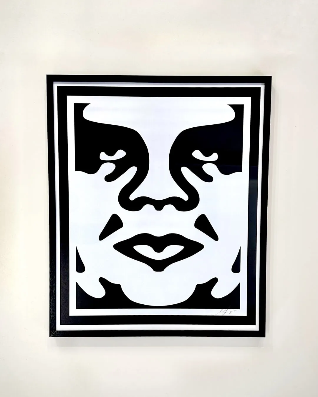 obey 3-face artworks by shepard fairey for sale at the wiseguys barbershop in glenhaven