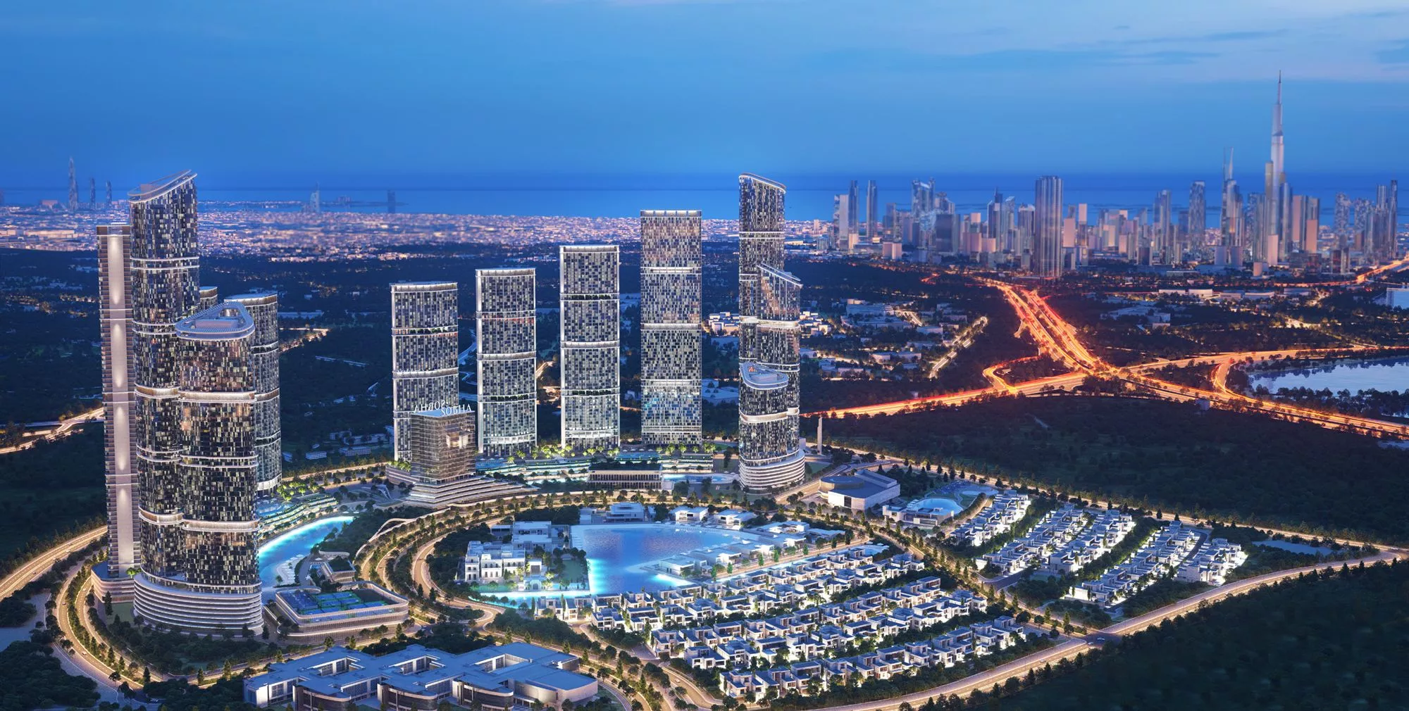 Night view of 360 Riverside Crescent at Sobha Heartland II, showing futuristic high-rise towers illuminated against a city skyline with busy roads