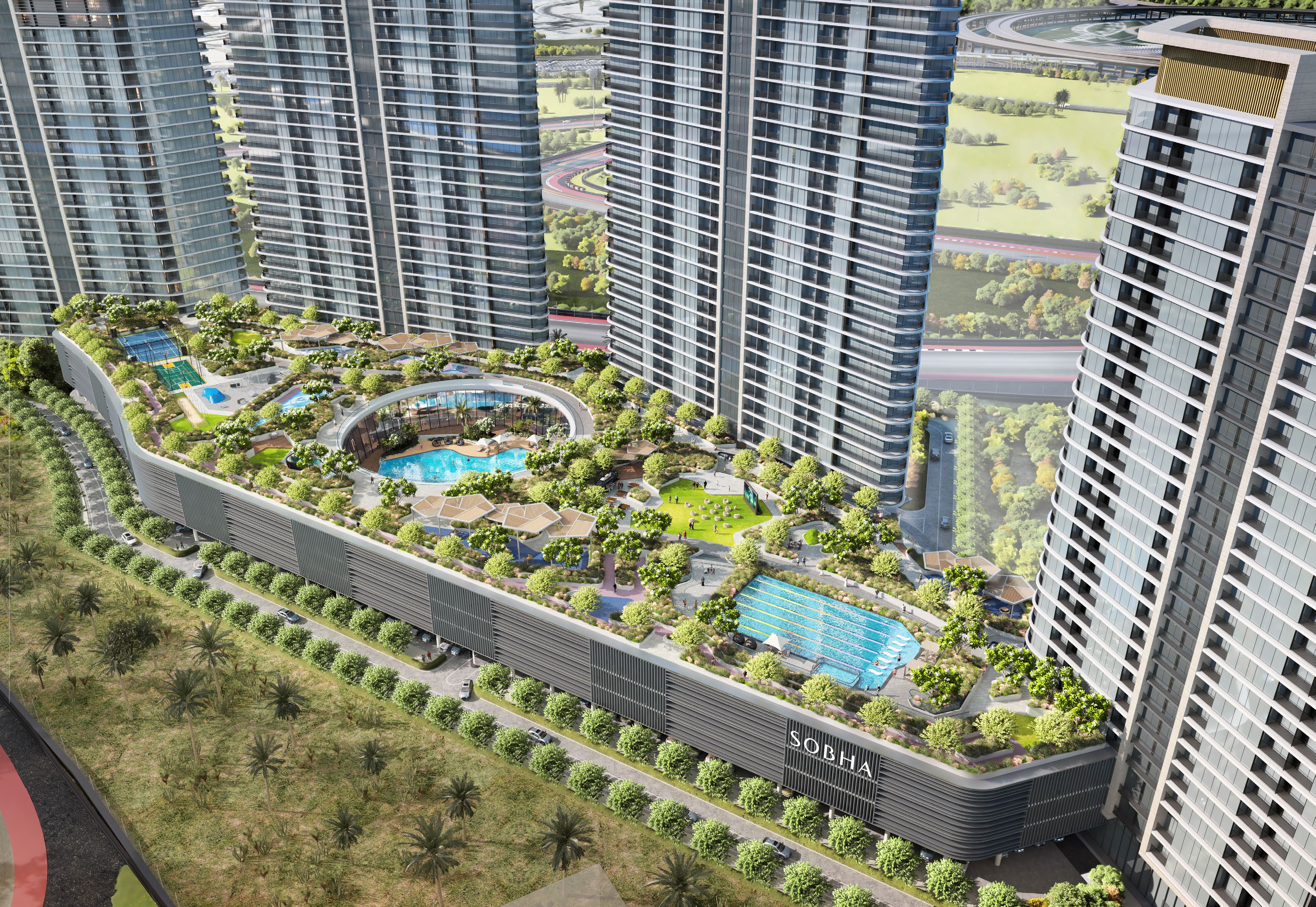 Landscaped rooftop of Sobha Solis at Motor City, featuring a circular pool, lush gardens, walking paths, and high-rise residential towers in the background