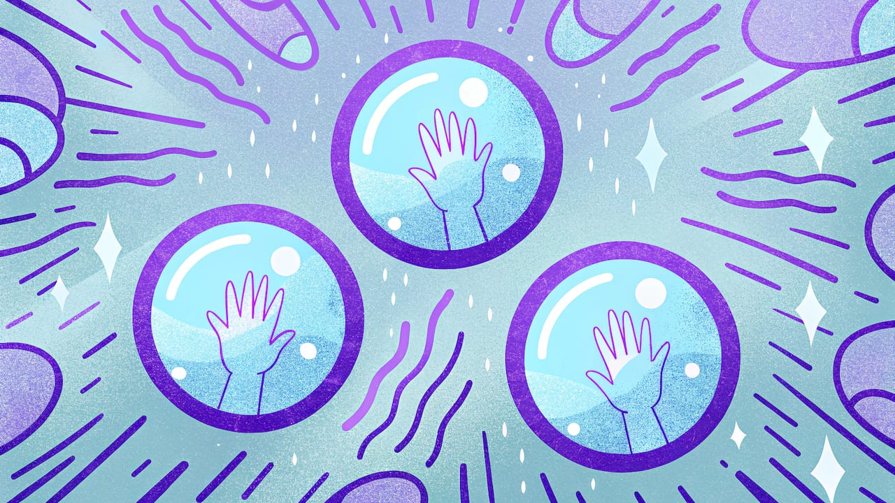 Hands sketching UX wireframes and journey maps