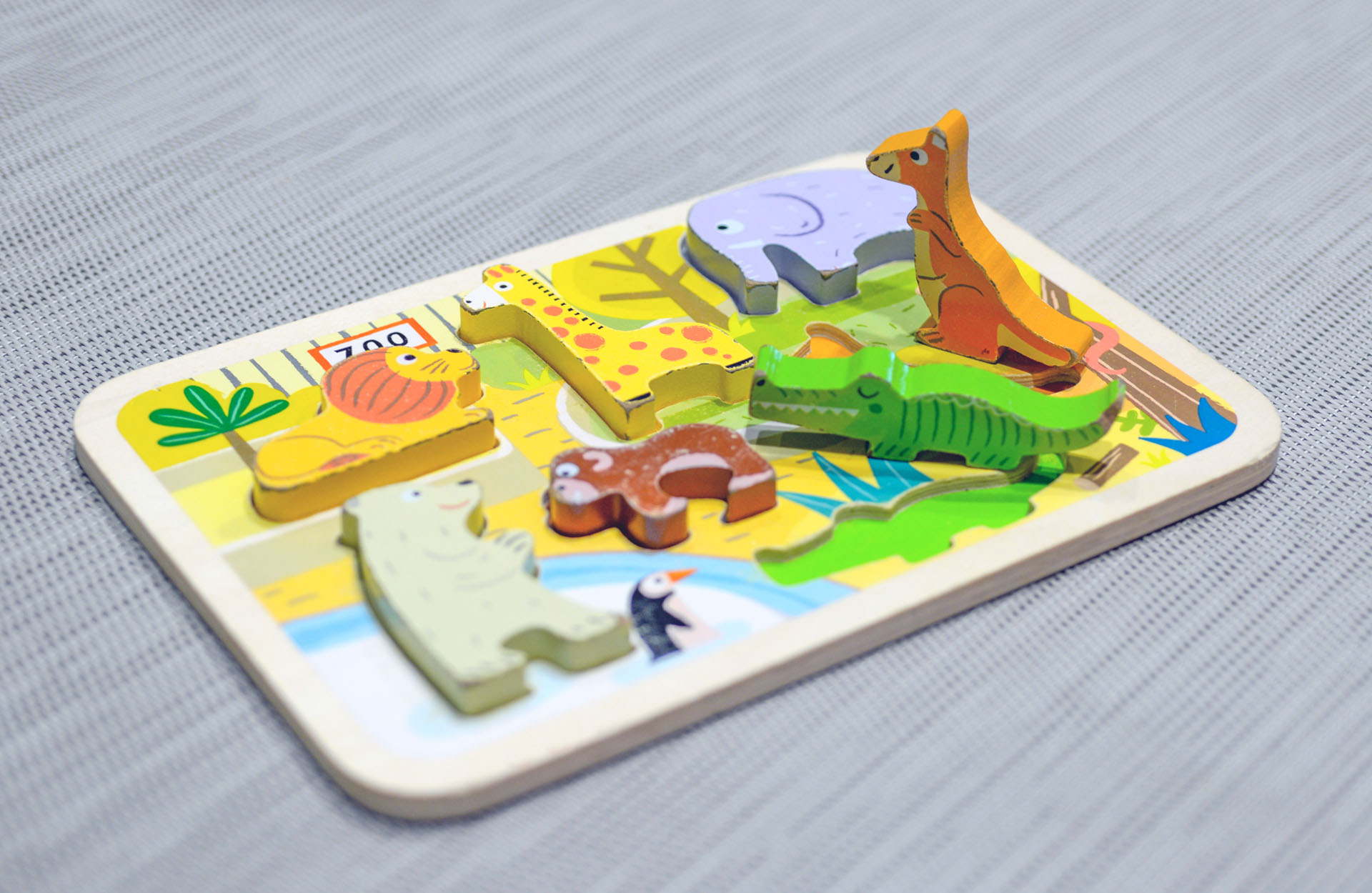 Colorful animal puzzle used in a child’s first therapy session to support early rapport building and playful goal‑setting.